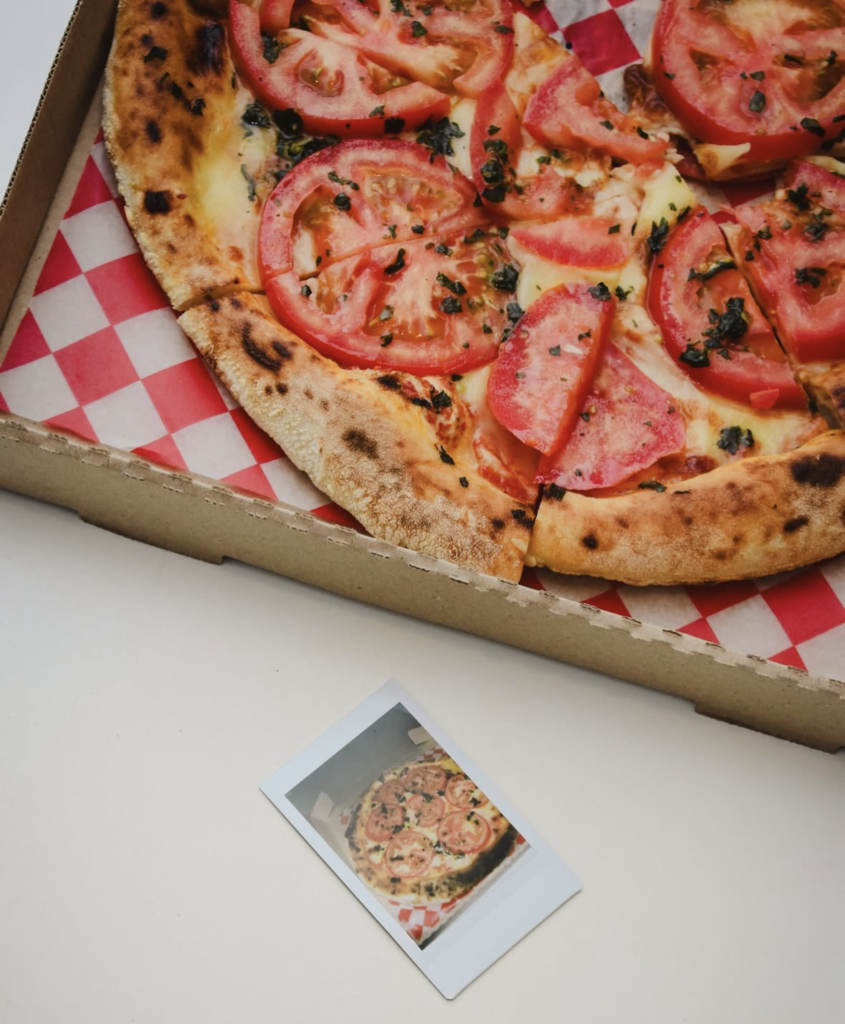 Pizza napolitana Capichi en su caja